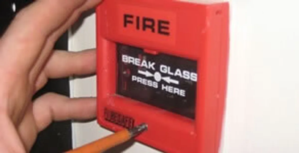 fire alarm installation service showing manual fire alarm pull station installed by licensed electricians in Charleston, SC