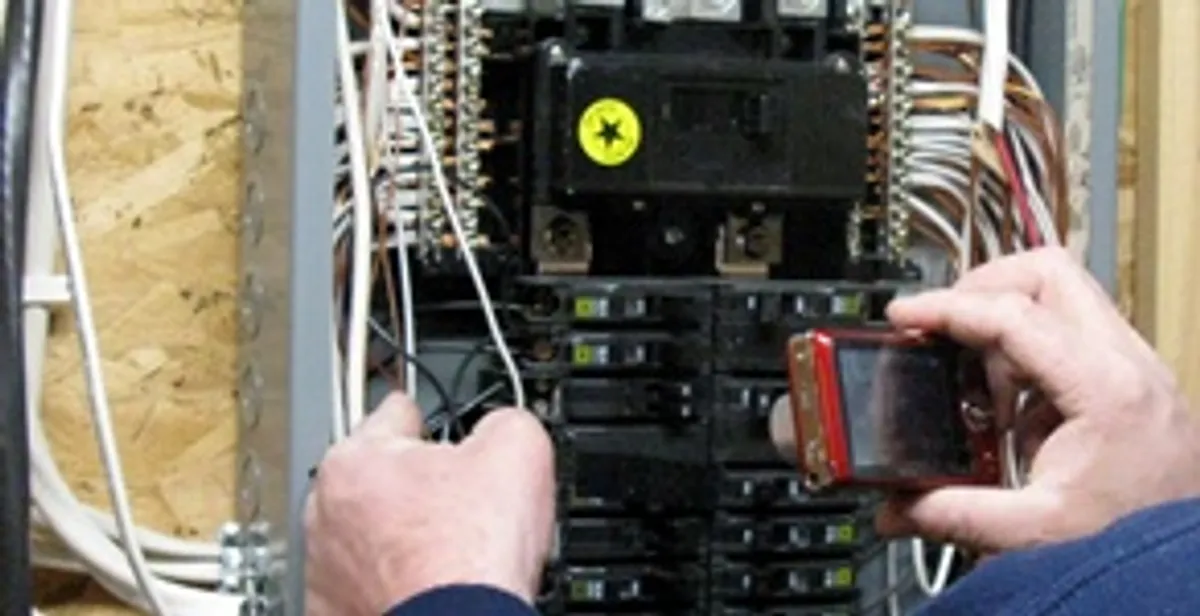 Home electrical inspection of circuit breaker panel by licensed electrician in Charleston, SC