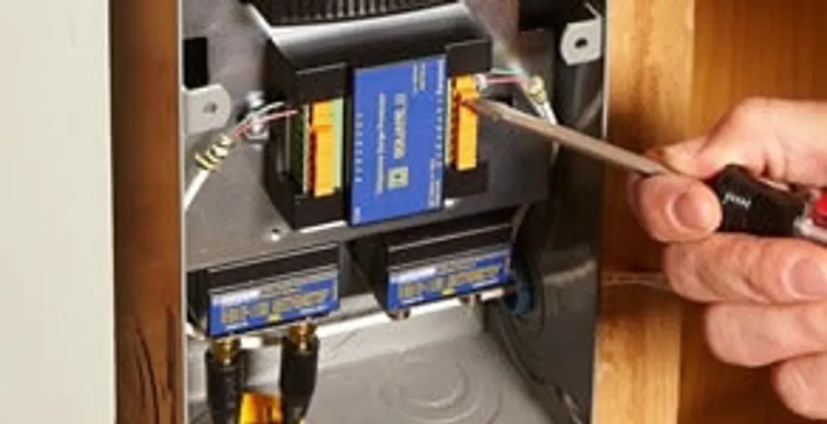 Whole home surge protection device being installed by a licensed electrician to protect electrical systems in Charleston, SC